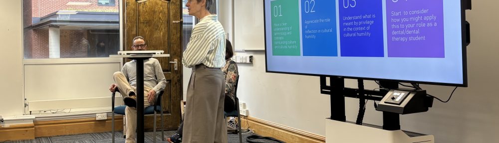 Professor Janice Ellis and Dr Ian Ellis present a slide outlining the meaning of cultural humility