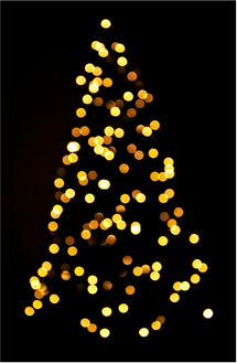 Blurry lights on a black background forming the shame of a christmas tree