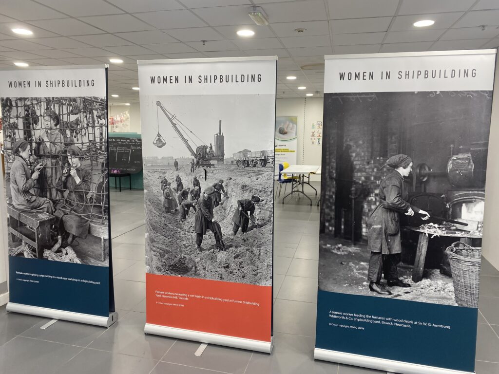 Photograph taken at the pop-up exhibition in Wallsend Forum shopping centre which displays the IWM’s images of North-East women shipyard workers during the First World War