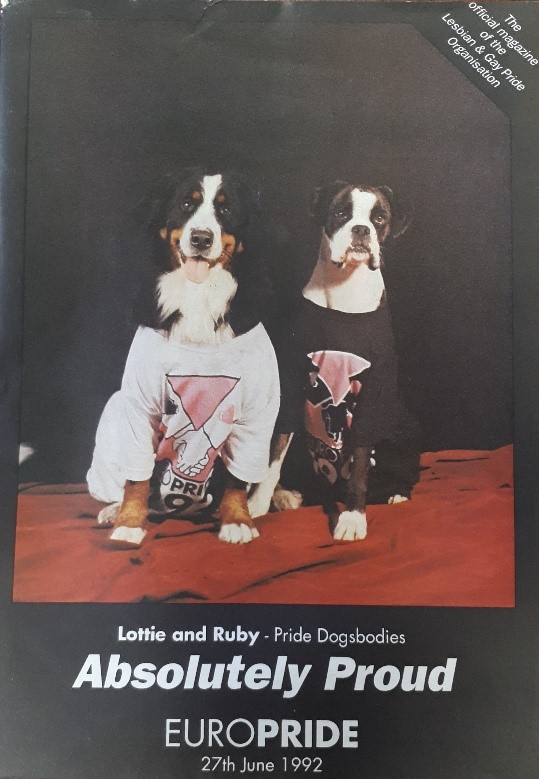 Magazine from the first EuroPride, showing a photograph of 2 dogs wearing t-shirts