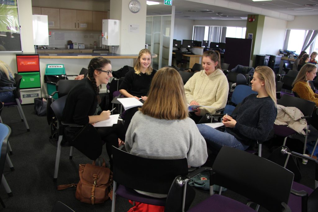 Students exploring children's books in the Seven Stories workshops. Image: Newcastle University 